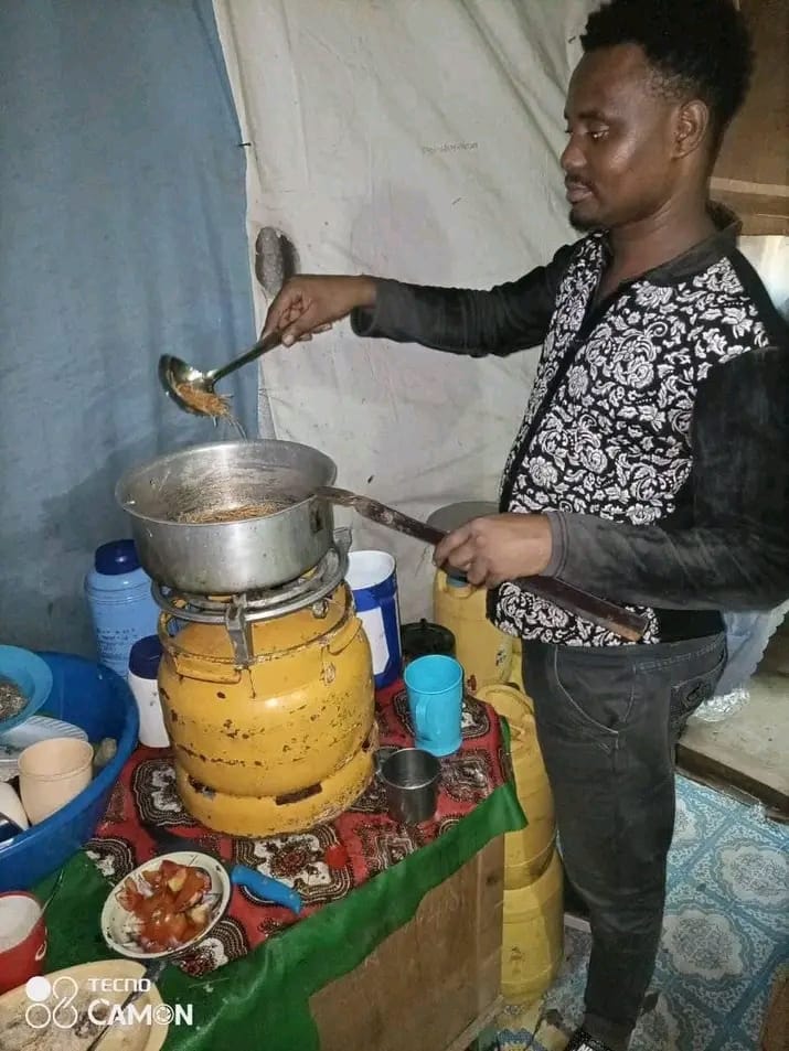 Alexandre cooking on college campus